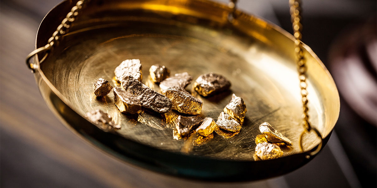 Imagen de pepitas de oro a través de Adobe Stock.